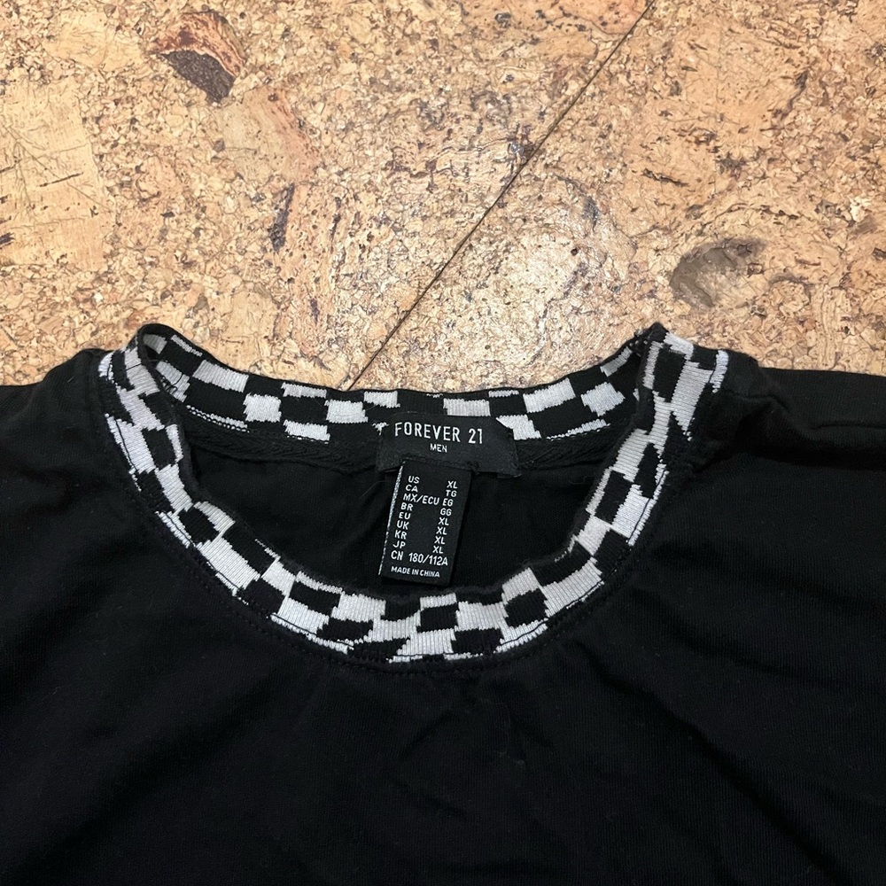 📌 Black T-Shirt with Checkered Trim
